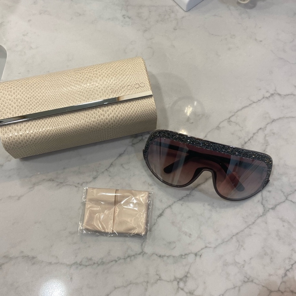Jimmy Choo sunglasses. Never worn. Tan with silver and sparkles.